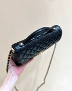 CHANEL QUILTED FLAP BAG WITH HANDLE 26 IN BLACK LAMBSKIN GOLD PLATED METAL