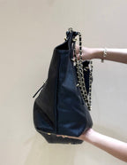 CHANEL LARGE MAXI SHOPPING BAG 59 IN BLACK CALFSKIN GOLD-TONE METAL
