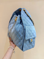 CHANEL 25 HANDBAG 40 IN BLUE DENIM GOLD HARDWARE