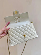 CHANEL QUILTED FLAP BAG WITH HANDLE 26 IN BEIGE LAMBSKIN GOLD PLATED METAL