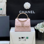 CHANEL QUILTED FLAP BAG WITH HANDLE 18 IN BABY PINK LAMBSKIN GOLD HARDWARE